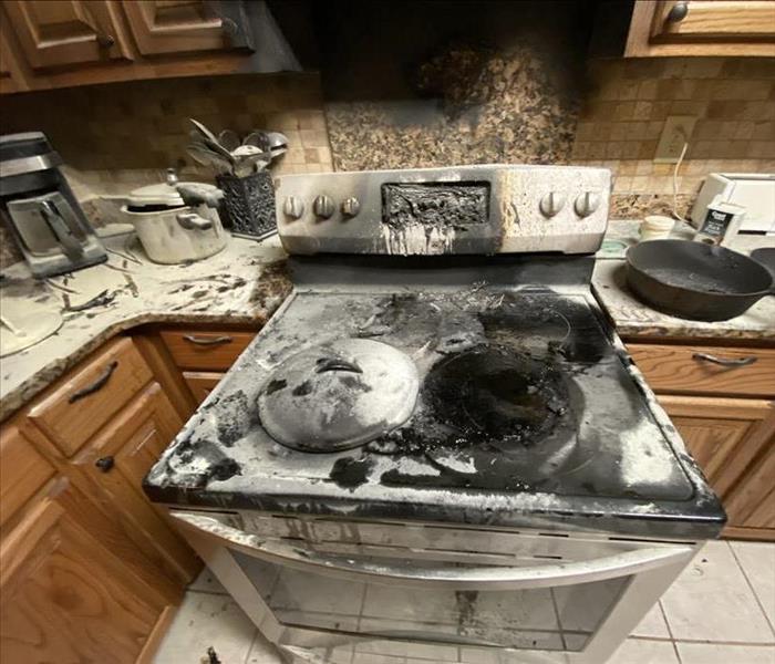 Fire damaged stovetop and oven 