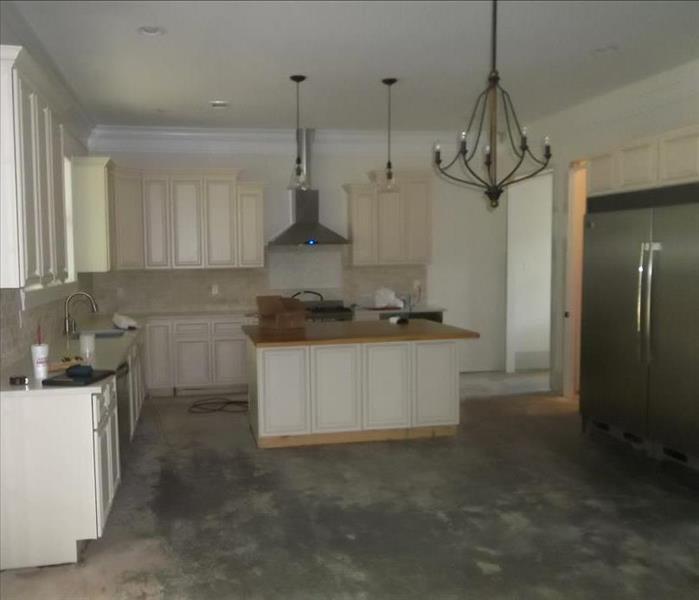 empty kitchen with floors removed 